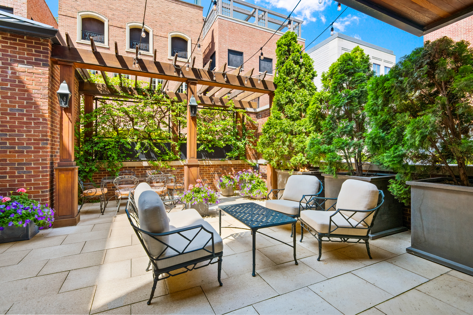 446 West Huron Street Chicago, IL 60654 - Photo 15 of 45 a balcony with couple of chairs and a potted plant
