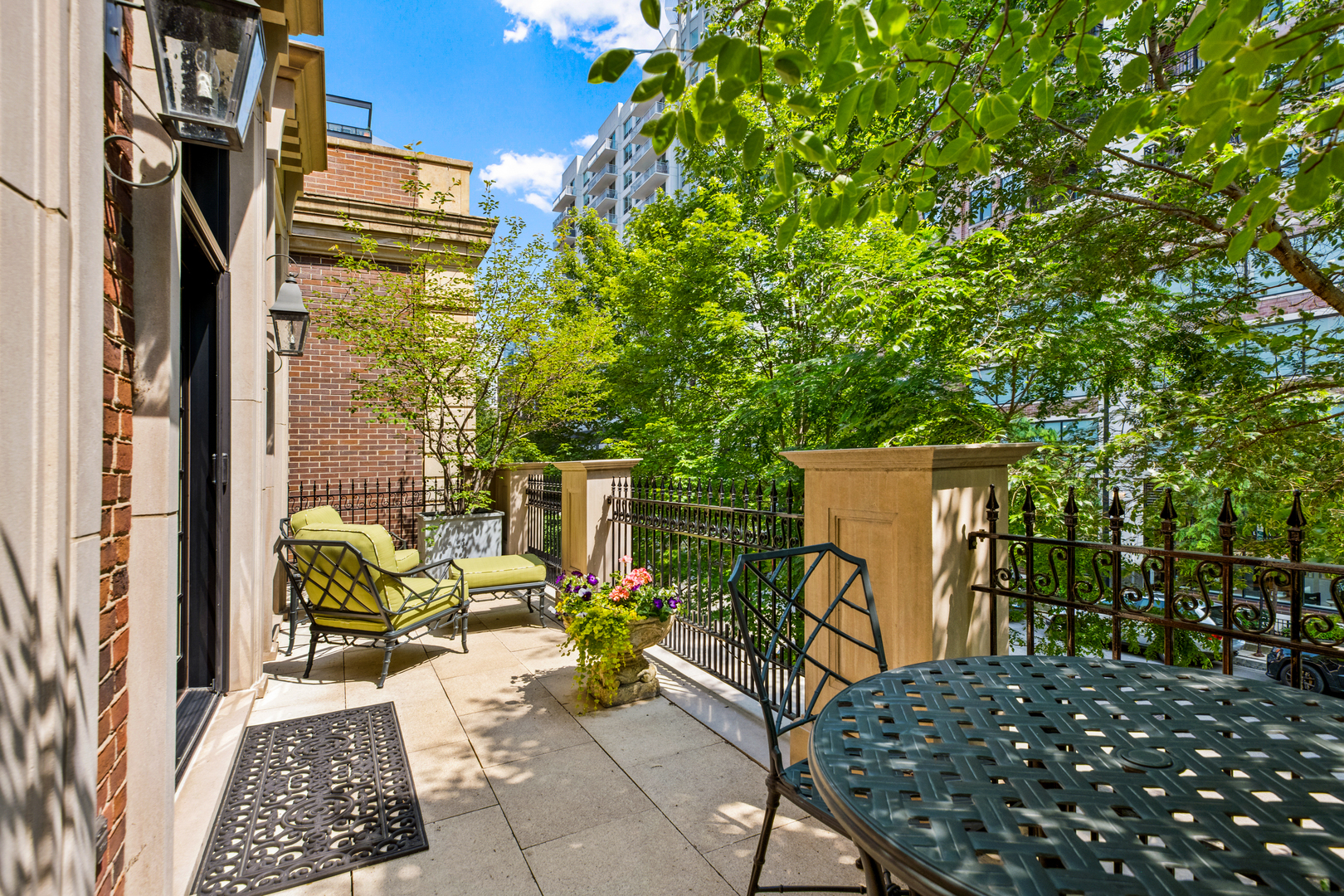 446 West Huron Street Chicago, IL 60654 - Photo 17 of 45 a view of balcony with two chairs and a potted plant