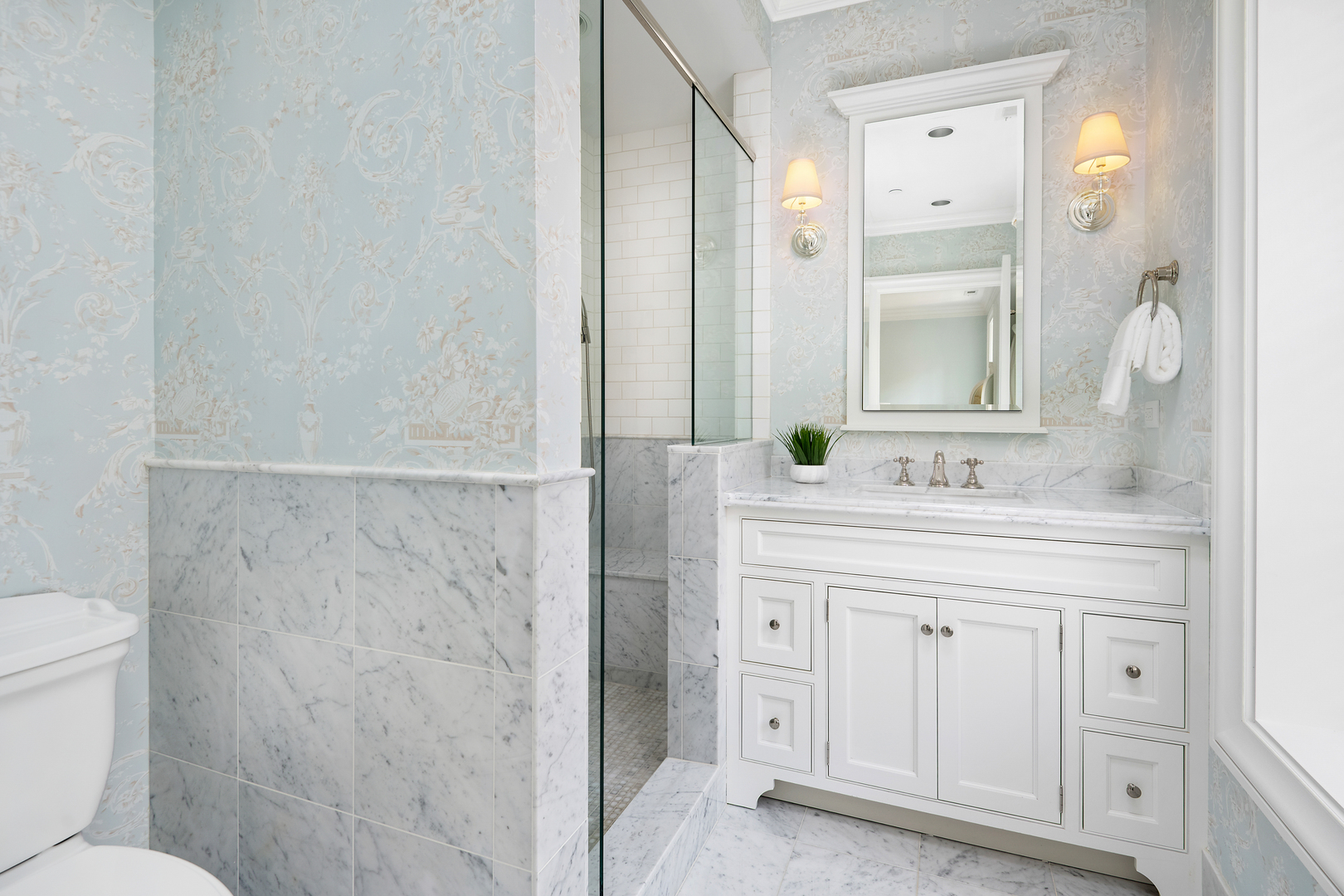 446 West Huron Street Chicago, IL 60654 - Photo 25 of 45 a bathroom with a granite countertop sink toilet and shower