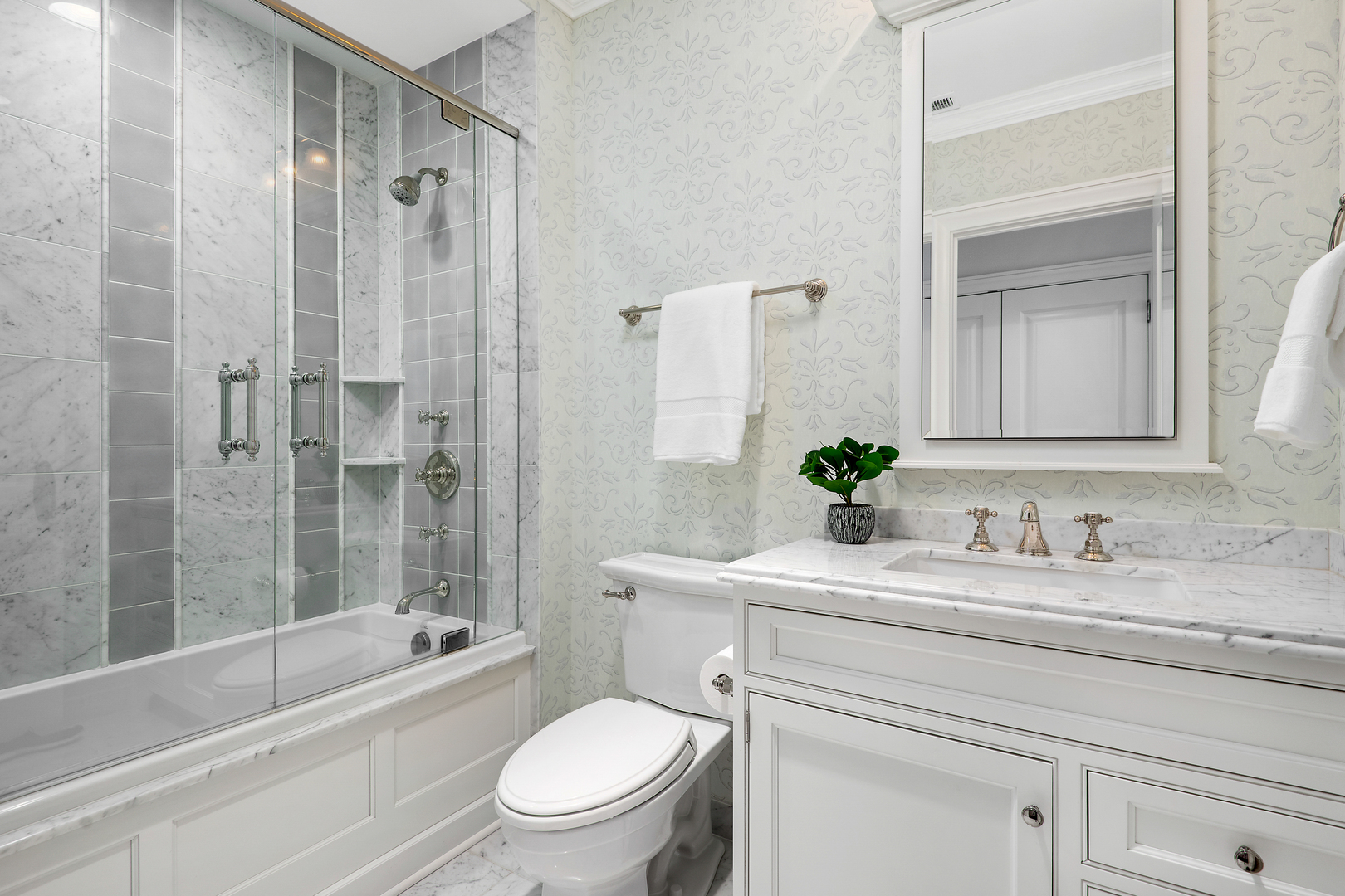 446 West Huron Street Chicago, IL 60654 - Photo 27 of 45 a bathroom with a sink toilet and shower