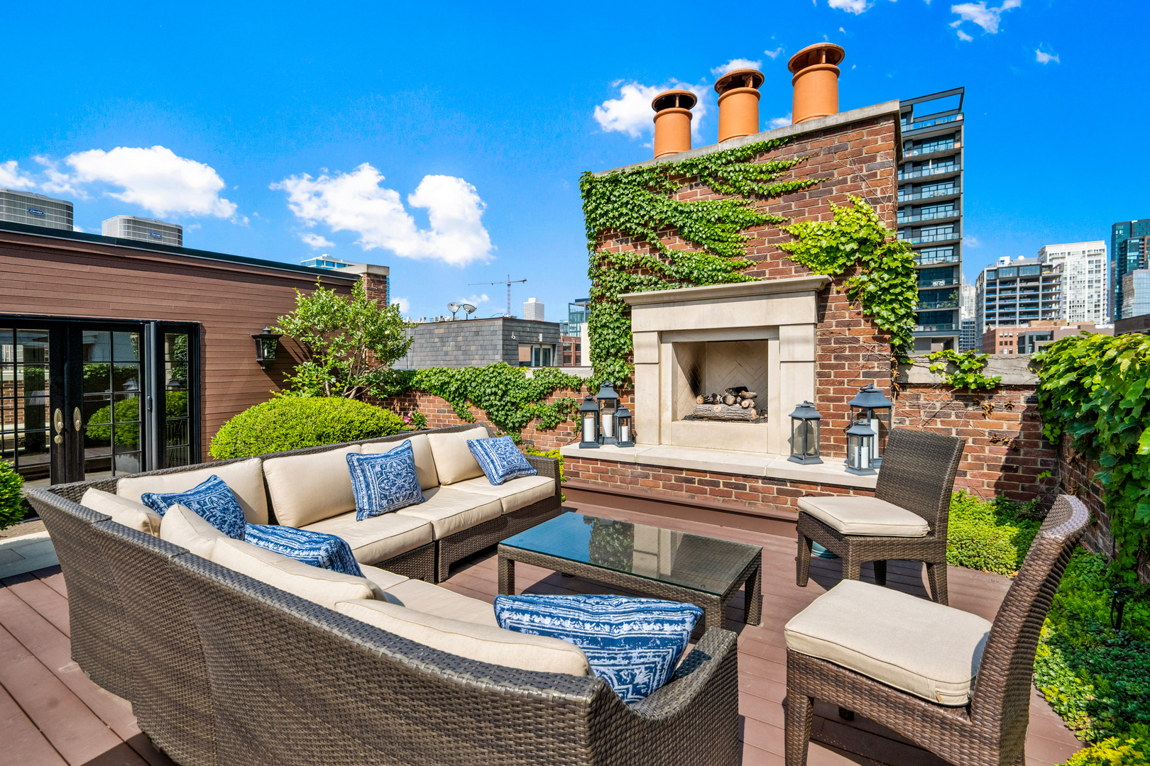 446 West Huron Street Chicago, IL 60654 - Photo 34 of 45 a view of a house with patio outdoor kitchen