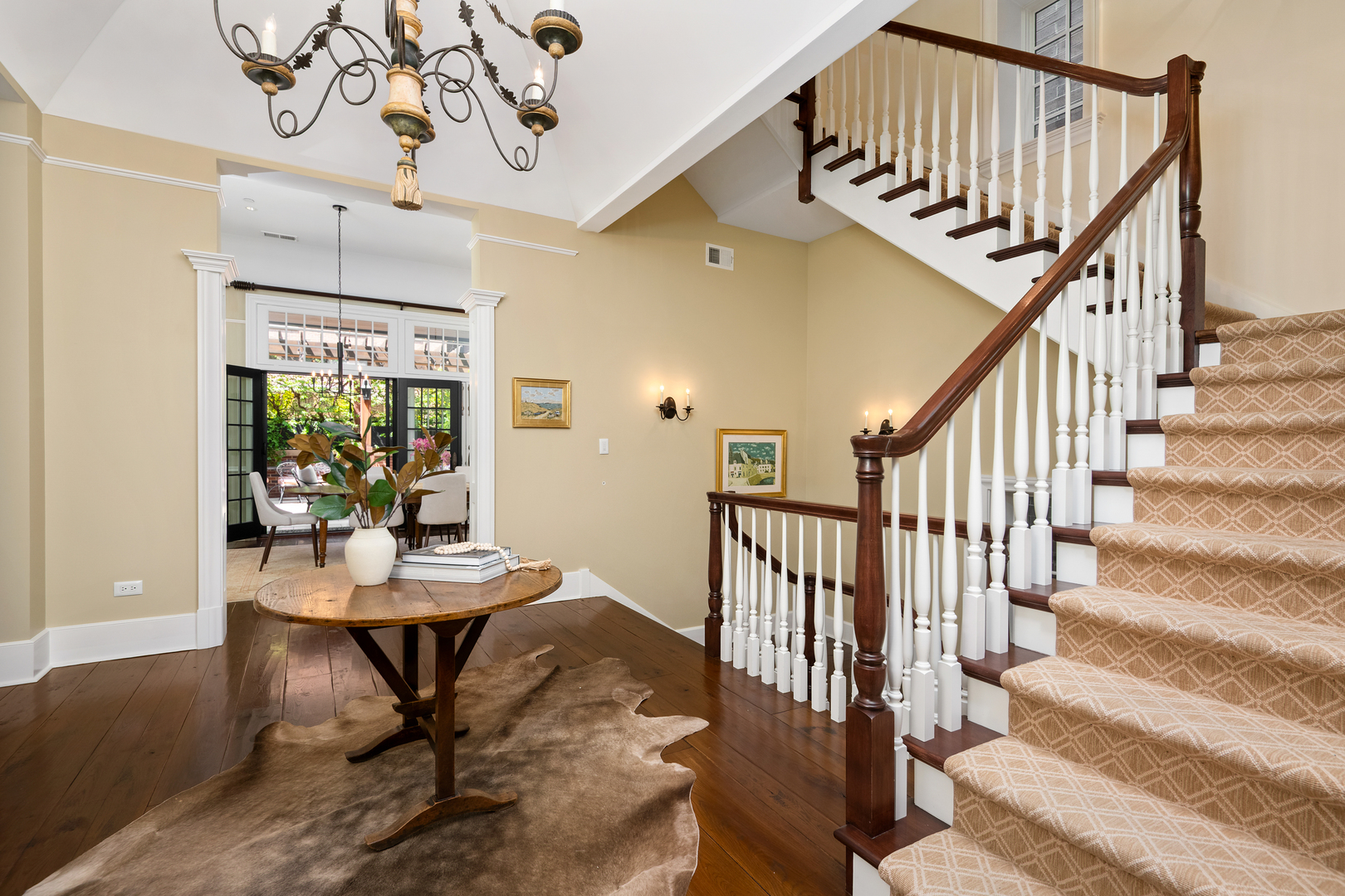 446 West Huron Street Chicago, IL 60654 - Photo 5 of 45 a view of a hallway with wooden floor and entryway
