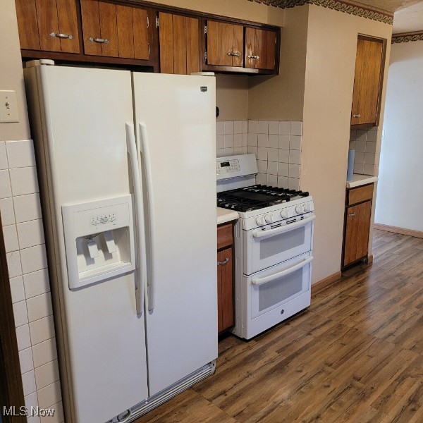 4897 Richmond Road Cleveland, OH 44128 - Photo 5 of 16 Eat-in-kitchen with white appliances & laminate flooring