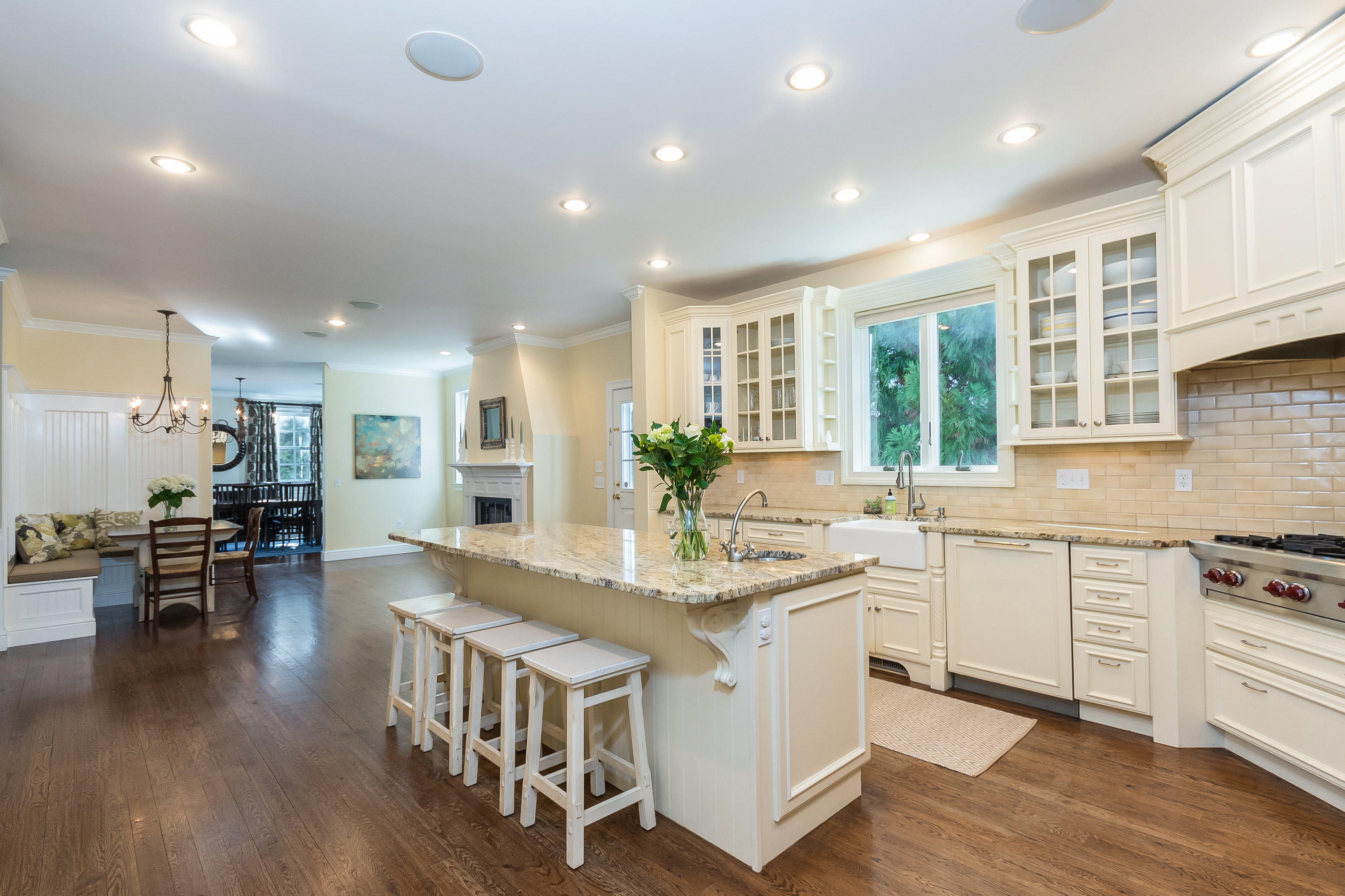 4 Beach Drive Darien, CT 06820 - Photo 16 of 47 a kitchen with stainless steel appliances granite countertop a stove and a wooden floors