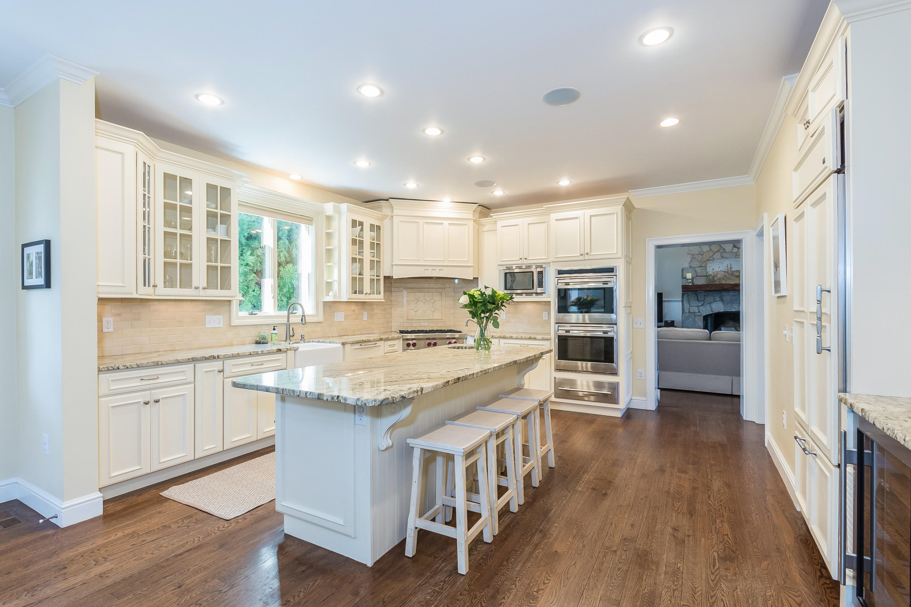 4 Beach Drive Darien, CT 06820 - Photo 17 of 47 a kitchen with stainless steel appliances granite countertop counter space a sink and cabinets