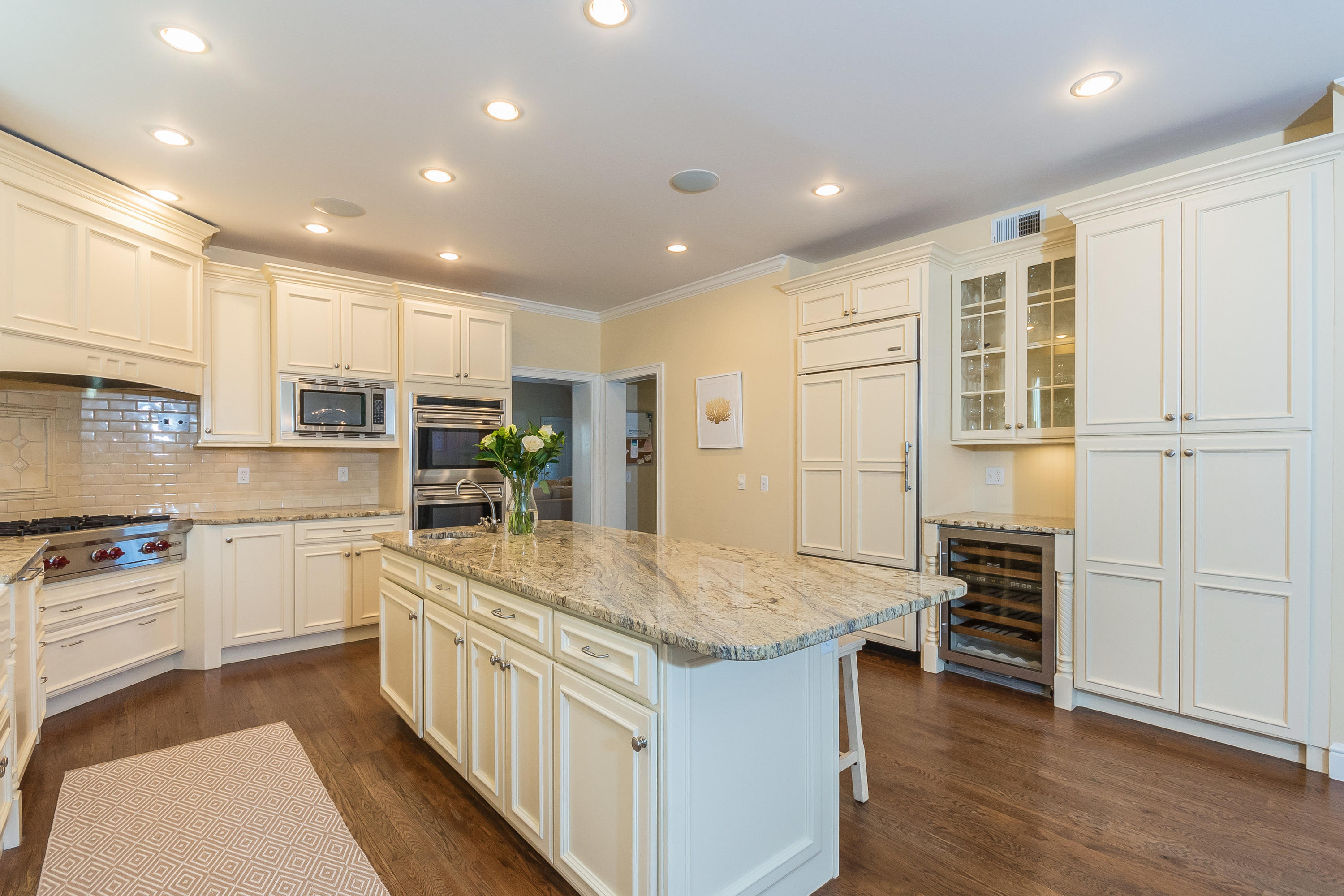 4 Beach Drive Darien, CT 06820 - Photo 19 of 47 a kitchen with kitchen island a sink stove and refrigerator