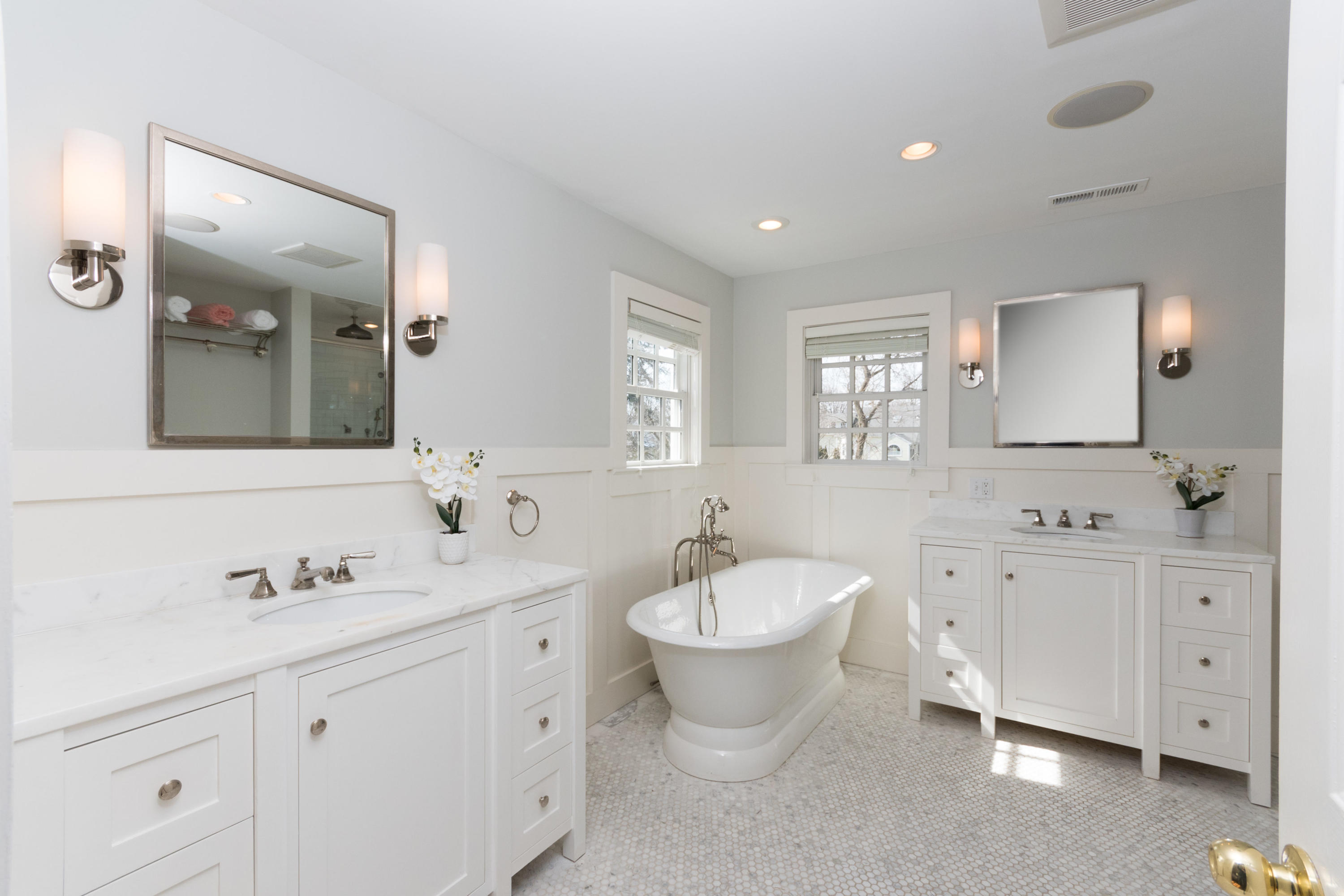 4 Beach Drive Darien, CT 06820 - Photo 26 of 47 a spacious bathroom with a double vanity sink a mirror and a