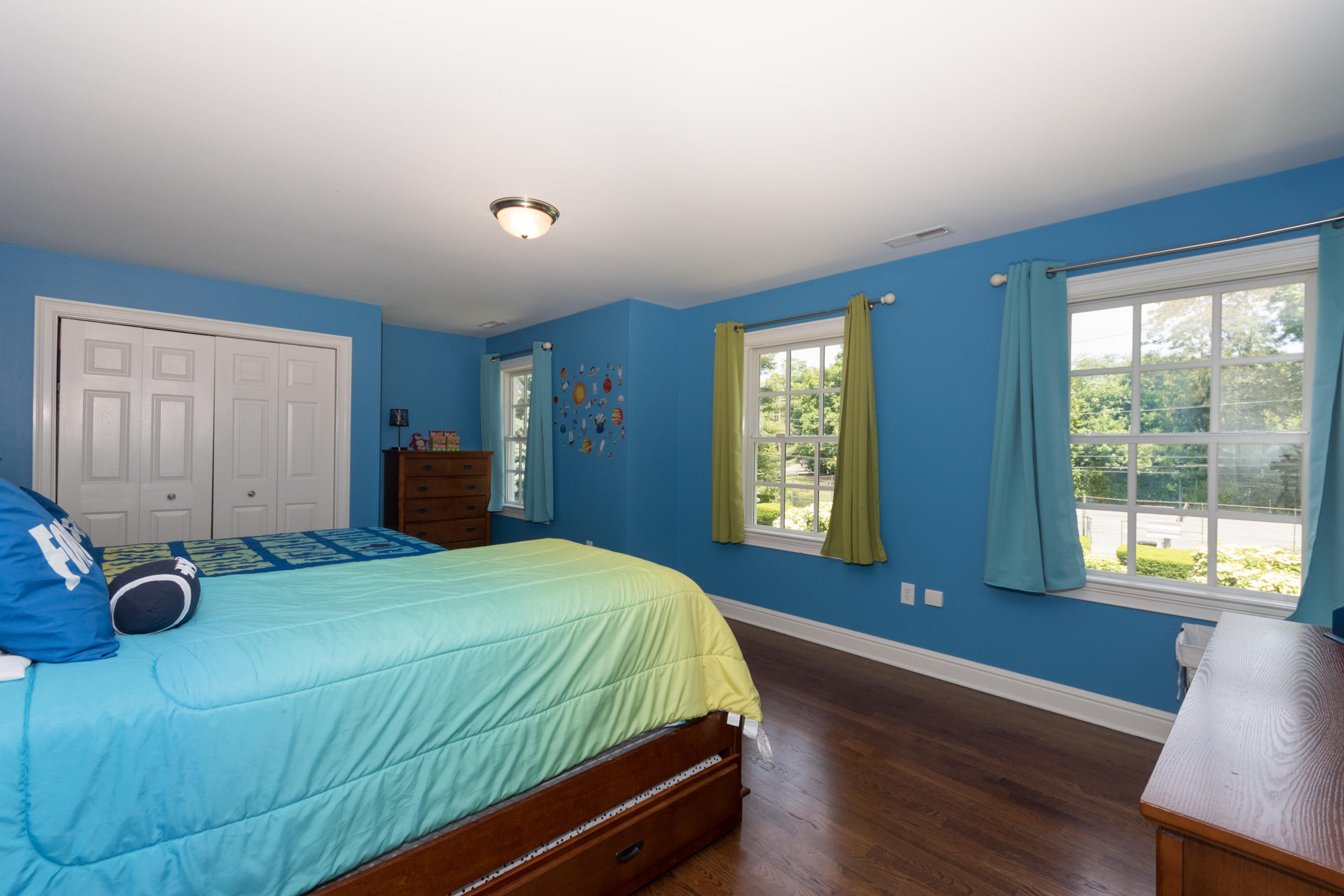 4 Beach Drive Darien, CT 06820 - Photo 30 of 47 a bedroom with a bed and window