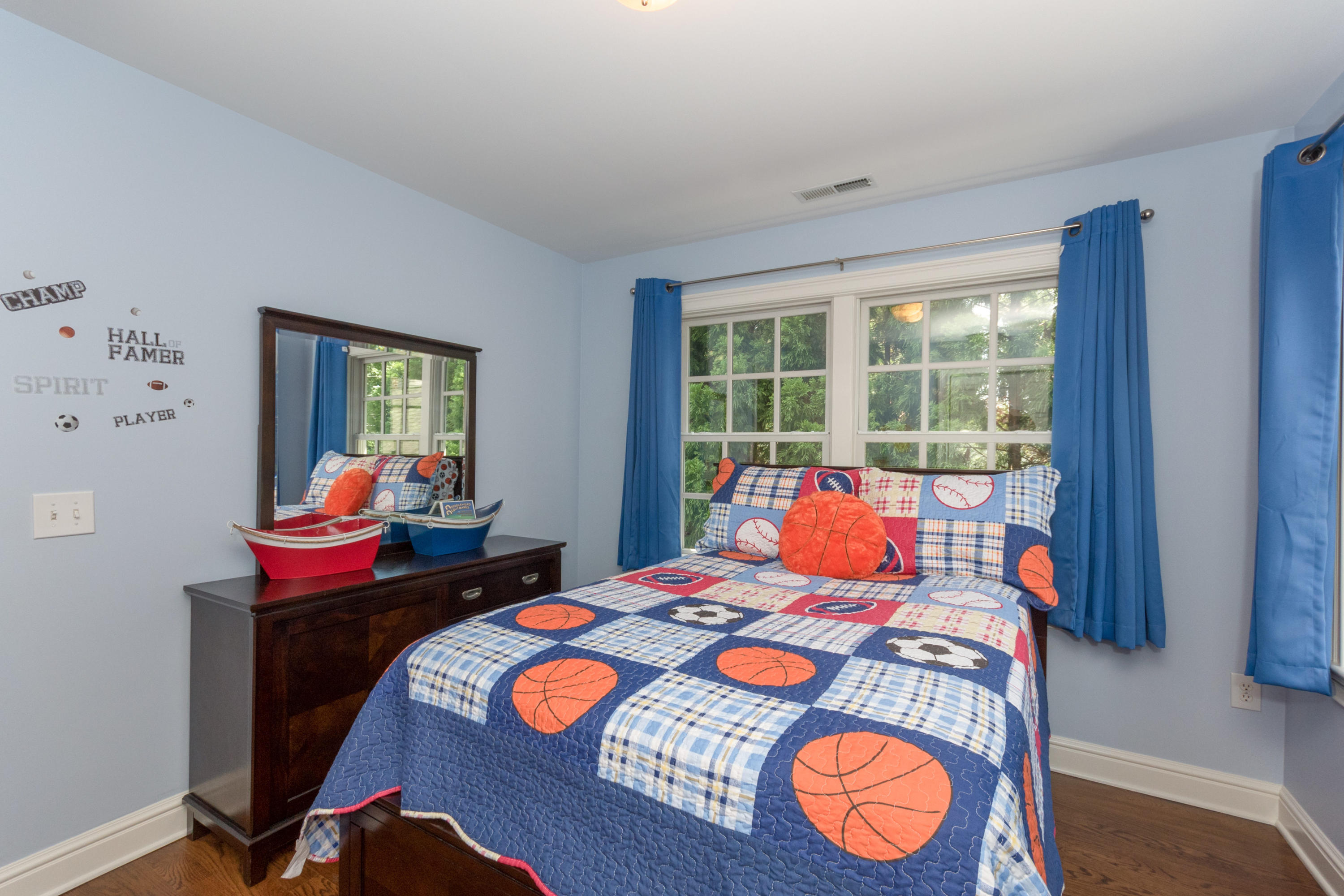 4 Beach Drive Darien, CT 06820 - Photo 32 of 47 a bedroom with a bed and a table in it