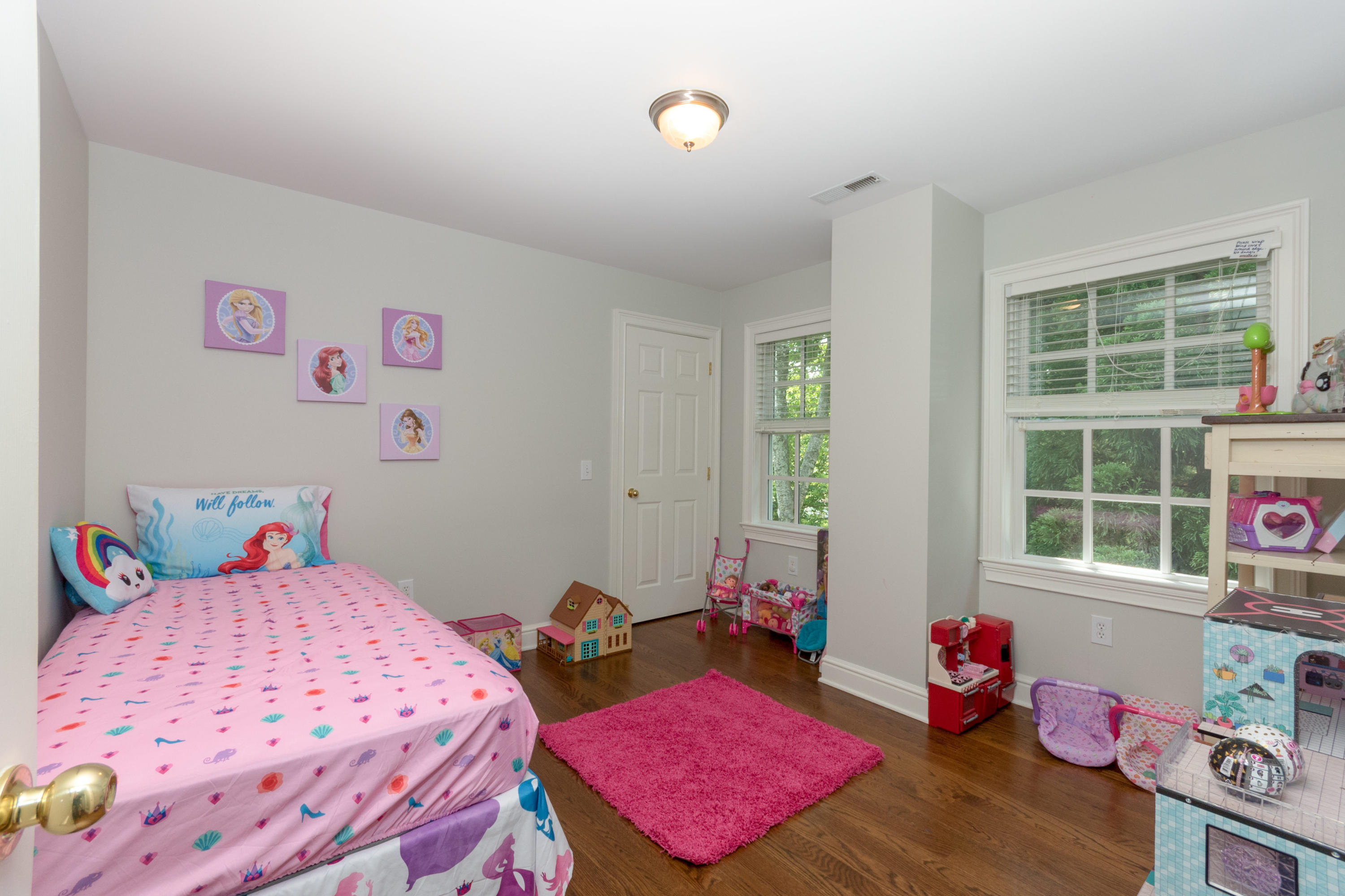 4 Beach Drive Darien, CT 06820 - Photo 33 of 47 a bedroom with a bed dresser and a window