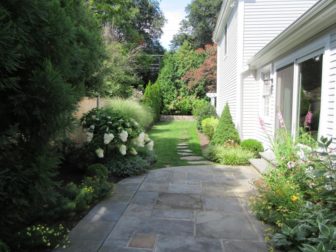 4 Beach Drive Darien, CT 06820 - Photo 45 of 47 a view of a back yard with garden
