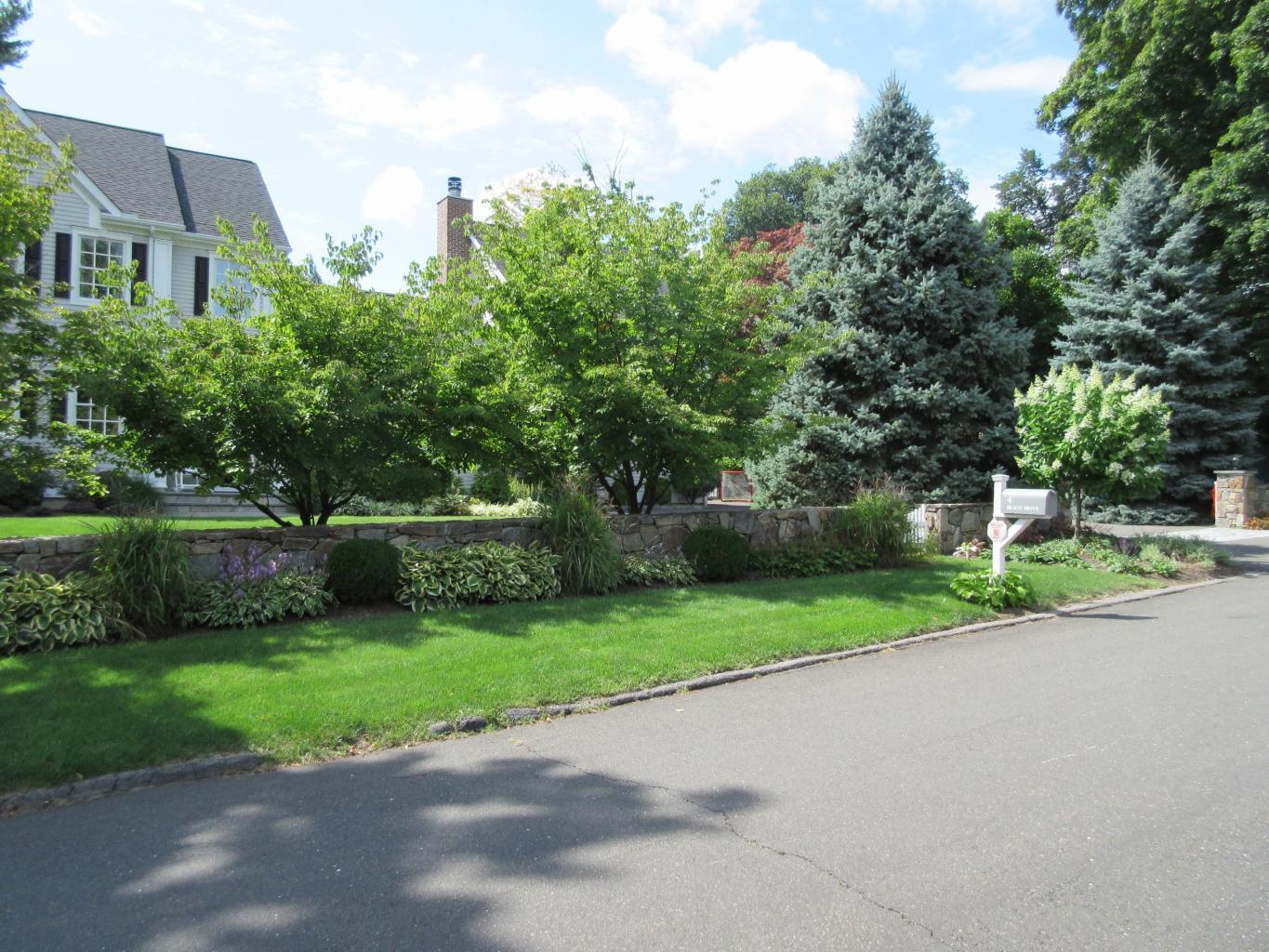 4 Beach Drive Darien, CT 06820 - Photo 47 of 47 a view of a garden with a house