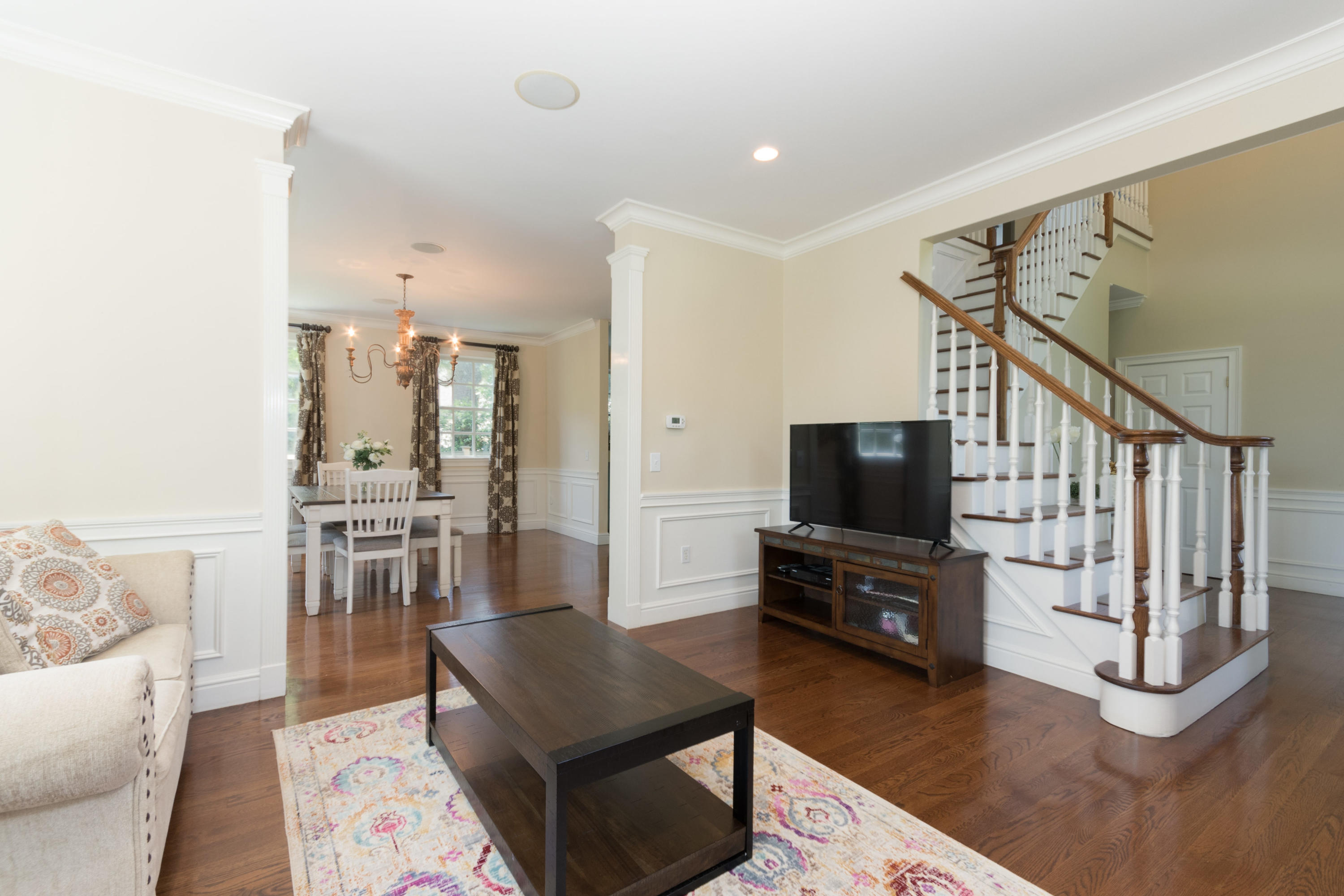 4 Beach Drive Darien, CT 06820 - Photo 8 of 47 a living room with furniture and a flat screen tv