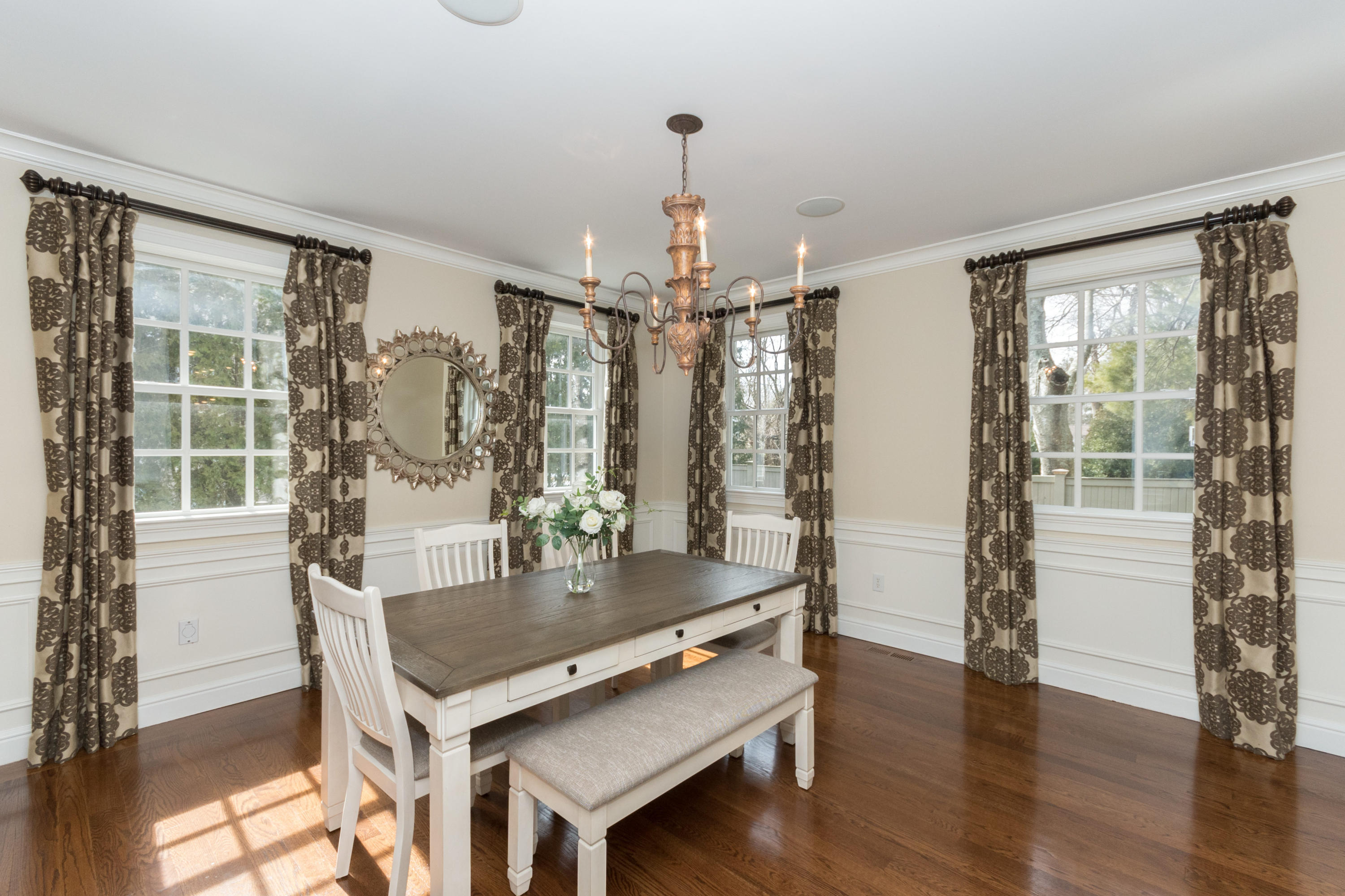4 Beach Drive Darien, CT 06820 - Photo 10 of 47 a view of a dining room with furniture and wooden floor