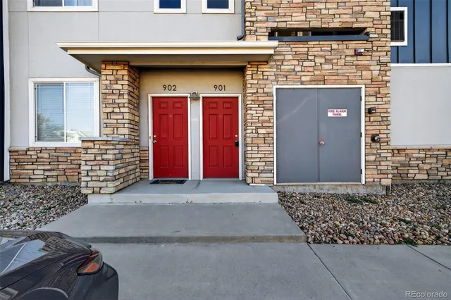 a front view of a house with a garage