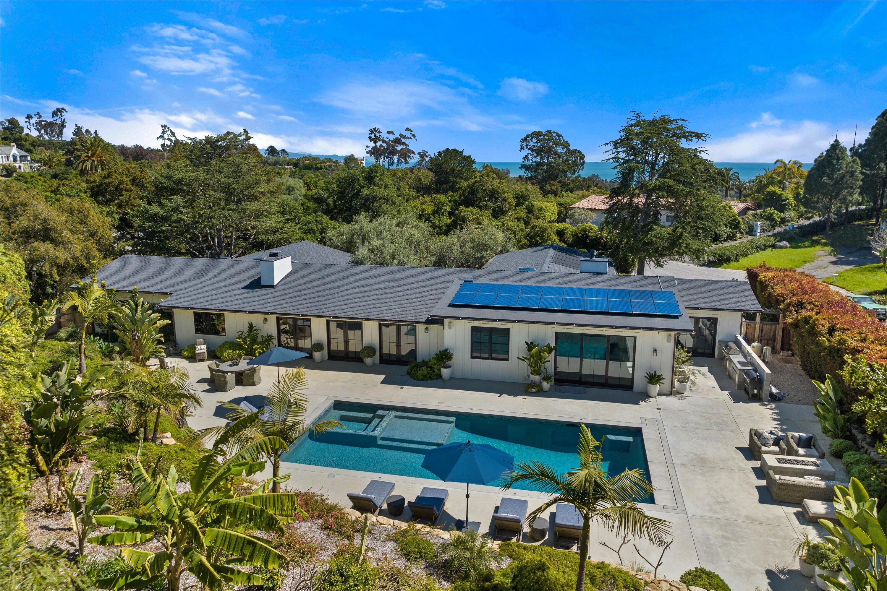 a view of a house with a big yard