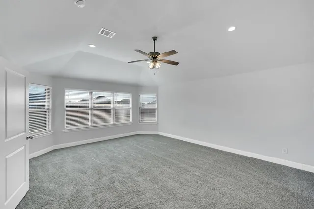 a view of a room with windows