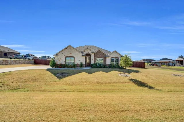 a view of a house with swimming pool