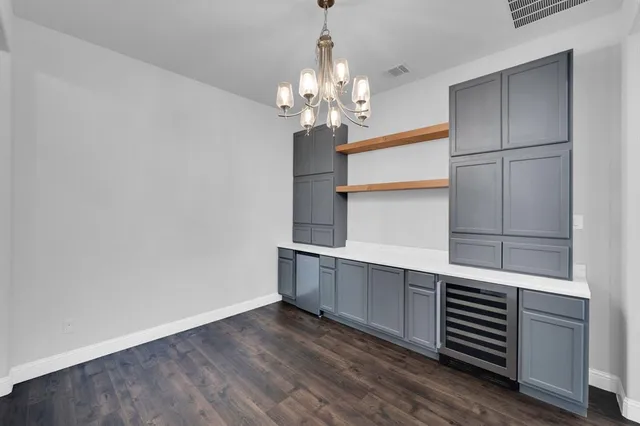 a view of kitchen with wooden floor and window