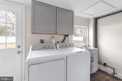 a utility room with dryer and washer