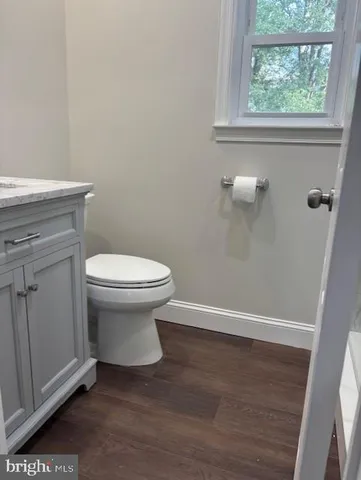 a bathroom with a toilet and a sink
