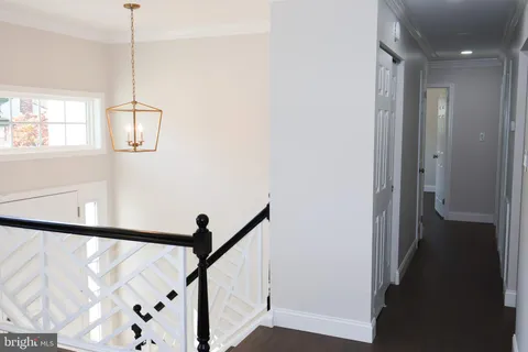 a view of a hallway with windows