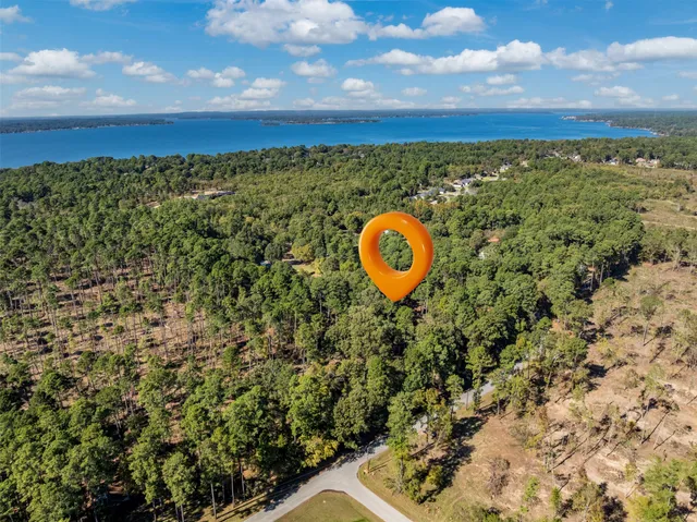 a view of a room with a swimming pool and mountain view