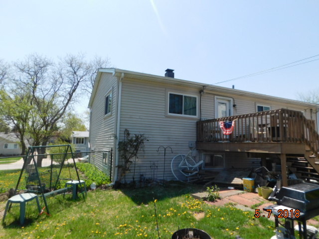 726 Terry Road Glendale Heights, IL 60139 - Photo 7 of 27 a view of house with yard