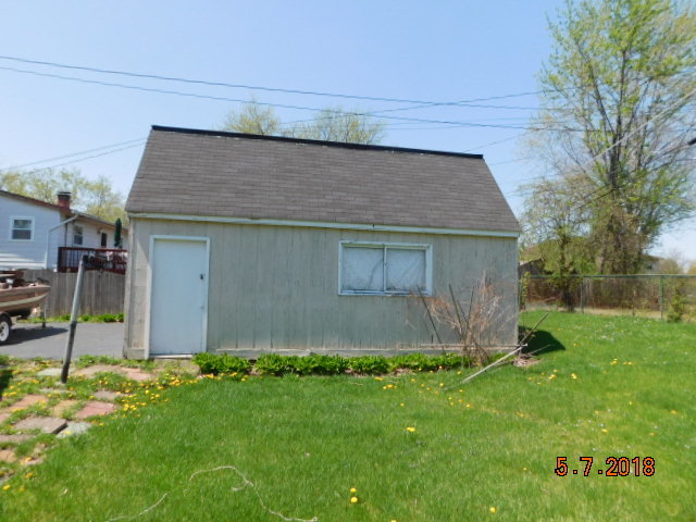 726 Terry Road Glendale Heights, IL 60139 - Photo 10 of 27 a front view of house with a garden