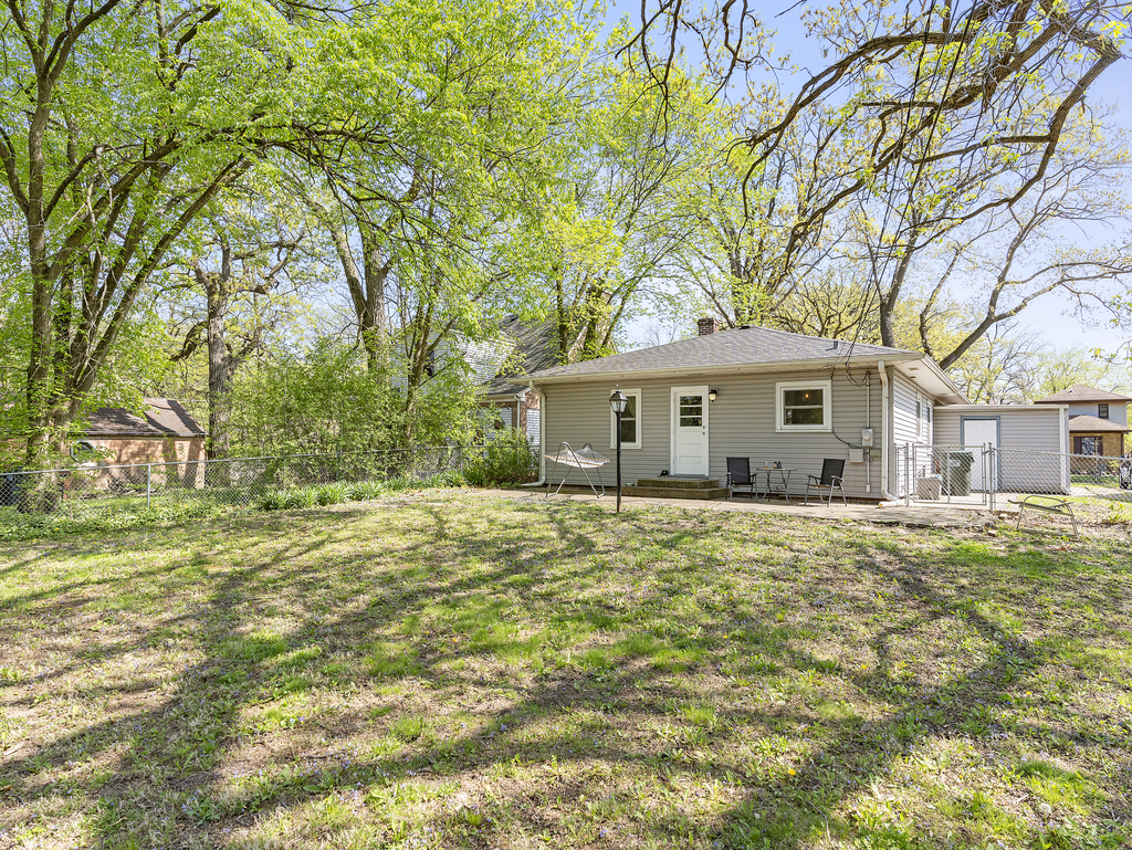1604 Pine Road Homewood, IL 60430 - Photo 13 of 17 a view of a house with a yard