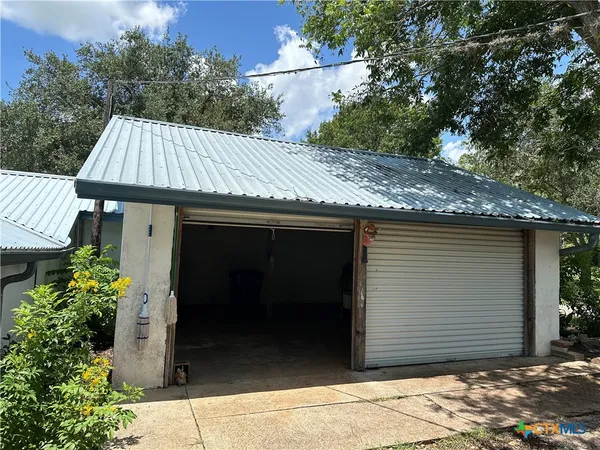 a view of a house with a garage