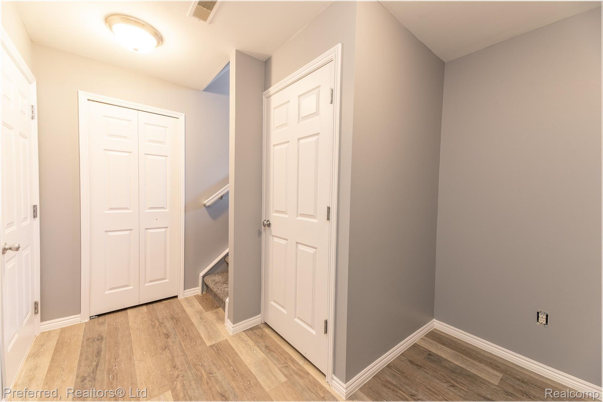 50115 Harding Street Canton, MI 48188 - Photo 22 of 26 lower level mudroom/storage room leads to garage