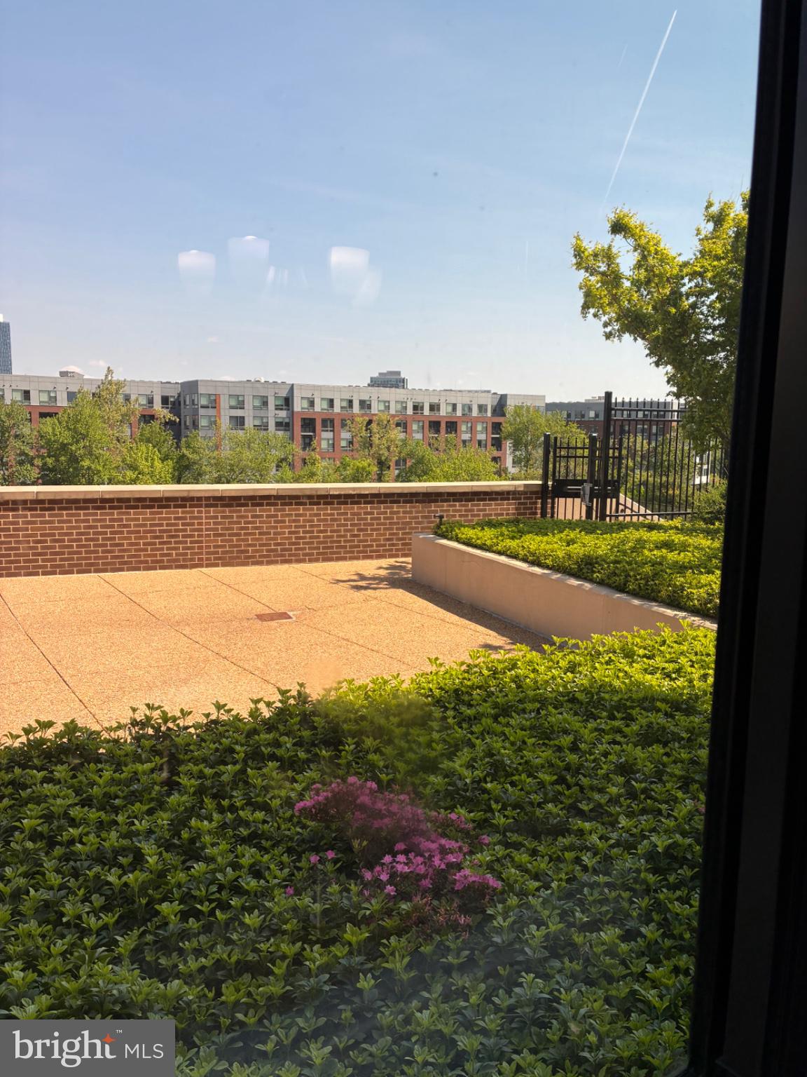 1800 Old Meadow Road, Unit 101 McLean, VA 22102 - Photo 19 of 77 Urban oasis with lush greenery.