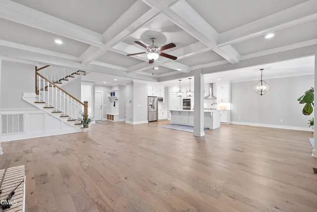a front view of a house with a yard table and chairs