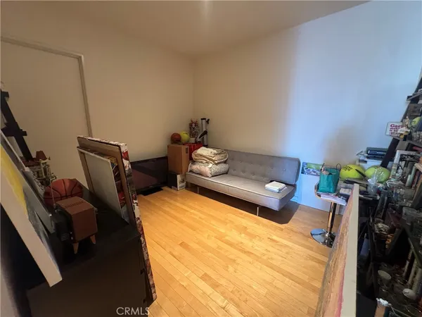 a bed room with a bed and a couch