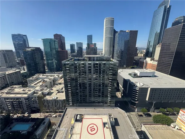 a view of city with tall buildings