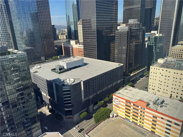 a view of a city with tall buildings