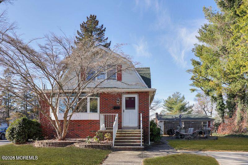47-49 Appleton Avenue Leonardo, NJ 07737 - Photo 1 of 15 a front view of a house with garden