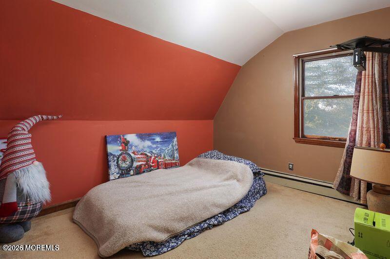 47-49 Appleton Avenue Leonardo, NJ 07737 - Photo 11 of 15 a bed sitting in a bedroom next to a window