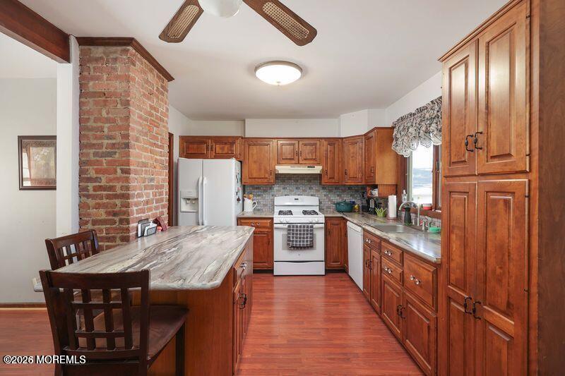 47-49 Appleton Avenue Leonardo, NJ 07737 - Photo 5 of 15 a kitchen with stainless steel appliances granite countertop a stove refrigerator and cabinets