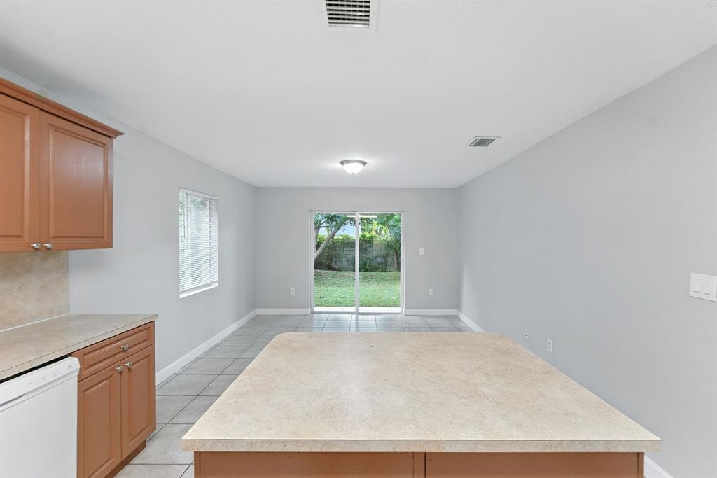 25355 Southwest 135th Court Homestead, FL 33032 - Photo 11 of 40 a view of an empty room with a window