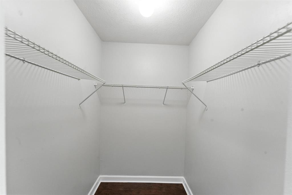 25355 Southwest 135th Court Homestead, FL 33032 - Photo 30 of 40 a view of a room with racks on the wall