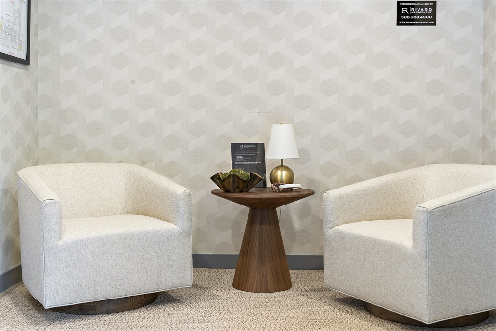 20 Kinmonth Road, Unit 301 Newton, MA 02468 - Photo 18 of 30 a bathroom with a sink and a mirror