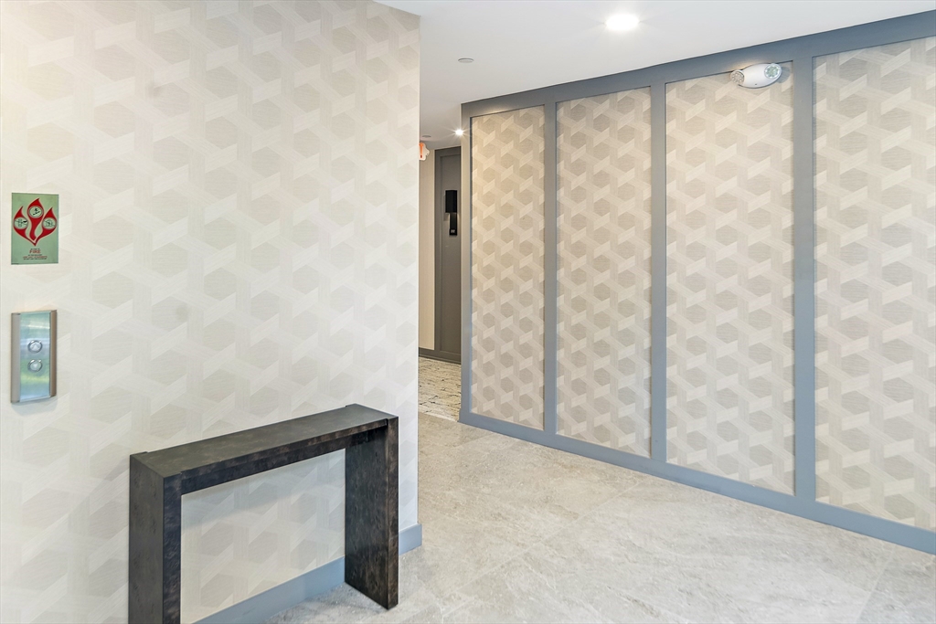 20 Kinmonth Road, Unit 301 Newton, MA 02468 - Photo 20 of 30 a view of front door with a door