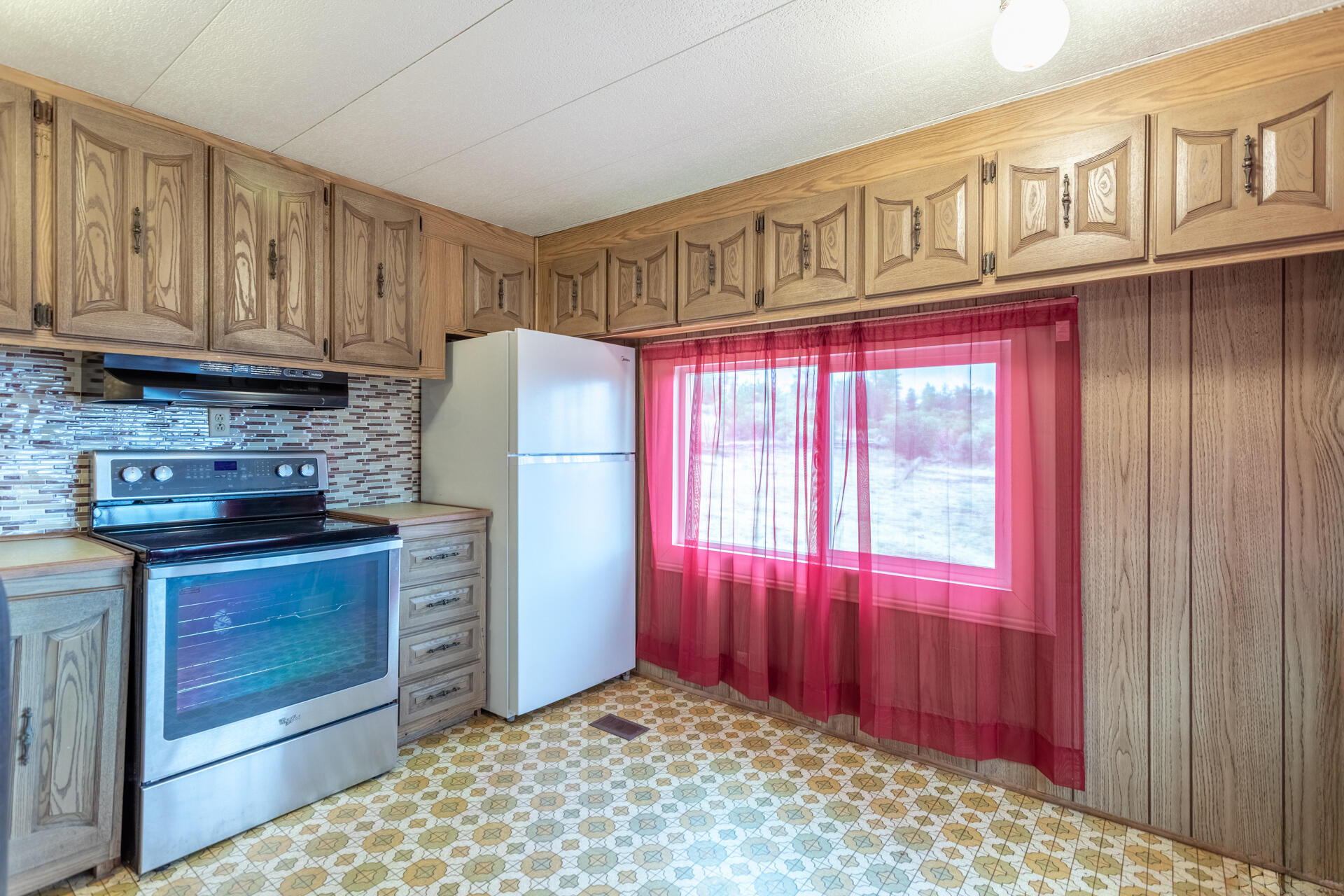 33150 Forward Road Manton, CA 96059 - Photo 5 of 12 a kitchen with stainless steel appliances granite countertop a refrigerator
