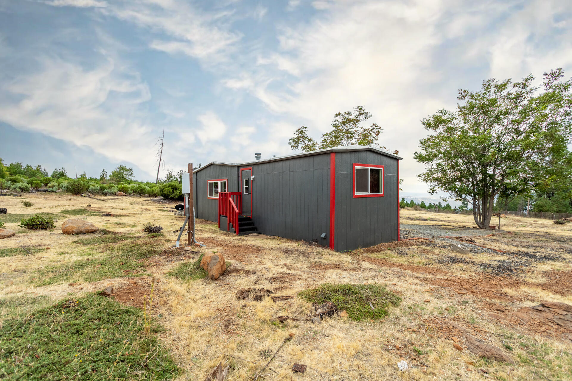 33150 Forward Road Manton, CA 96059 - Photo 9 of 12 a view of a house with a yard
