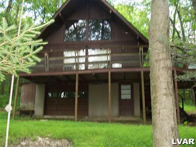 358 Hemlock Road Kunkletown, PA 18058 - Photo 1 of 10 front view of a house with a yard