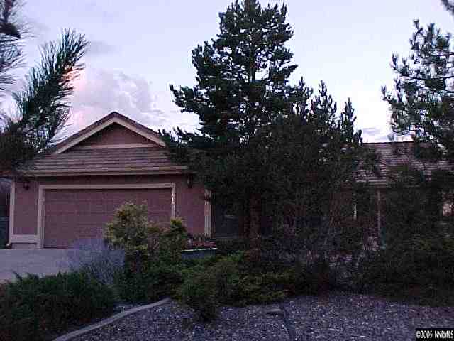 13180 Fellowship Way Reno, NV 89511 - Photo 1 of 9 a front view of a house with garden