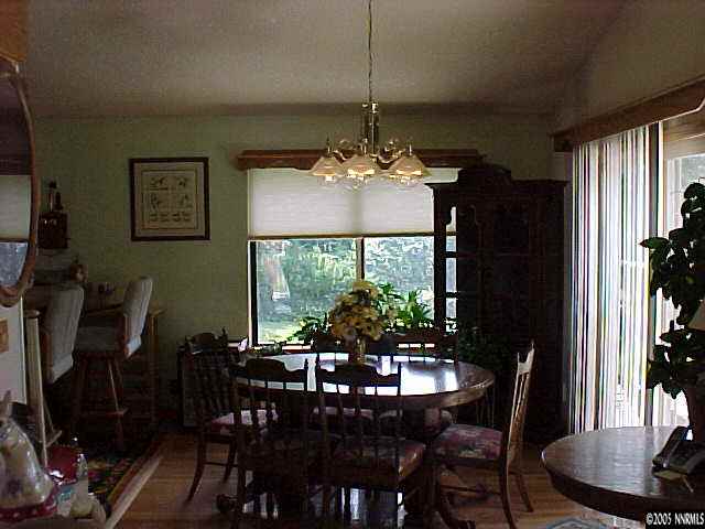 13180 Fellowship Way Reno, NV 89511 - Photo 4 of 9 a dining room with furniture and window