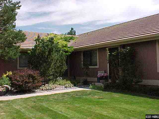 13180 Fellowship Way Reno, NV 89511 - Photo 5 of 9 a front view of house with yard and green space